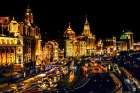 The Bund, old part of Shanghai, China, Night Illuminated with cars. Art Print